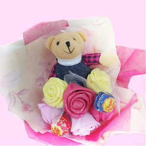 Image Title Bouquet of 6 roses, a bear & 2 lollipops